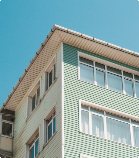 Multi-story residential building demonstrating our transparent commission and payment system